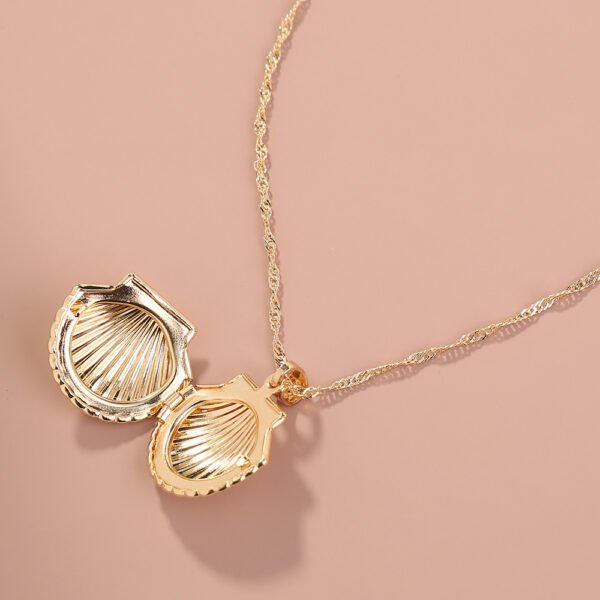 A Copper Shell Necklace That Opens - Image 2