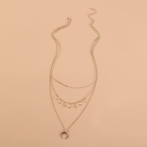 The stars, the crescent moon, the brass chain, the multi-layered necklace - Image 4